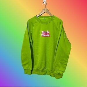 Lime green sweatshirt with a cheeky decal. Size Med